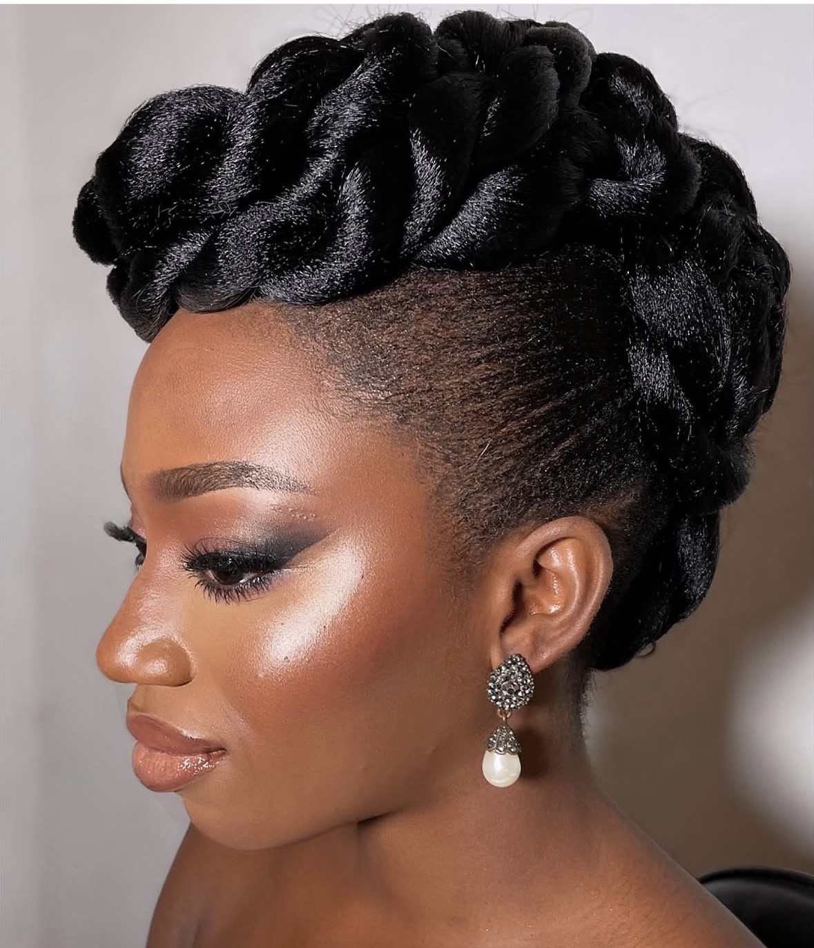 Sculpted braided updo profile