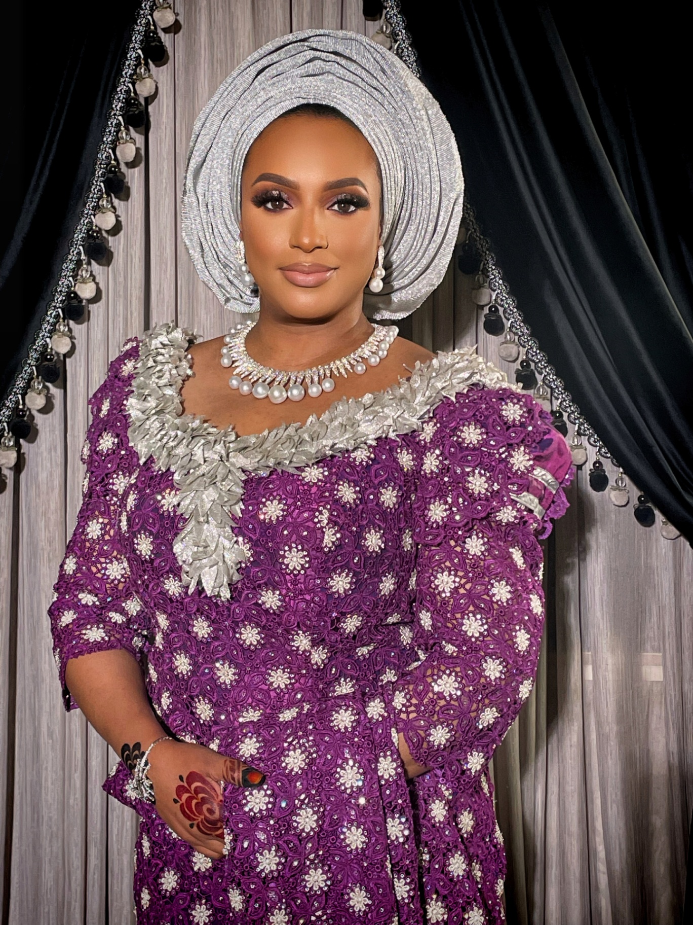 Silver gele with purple lace outfit