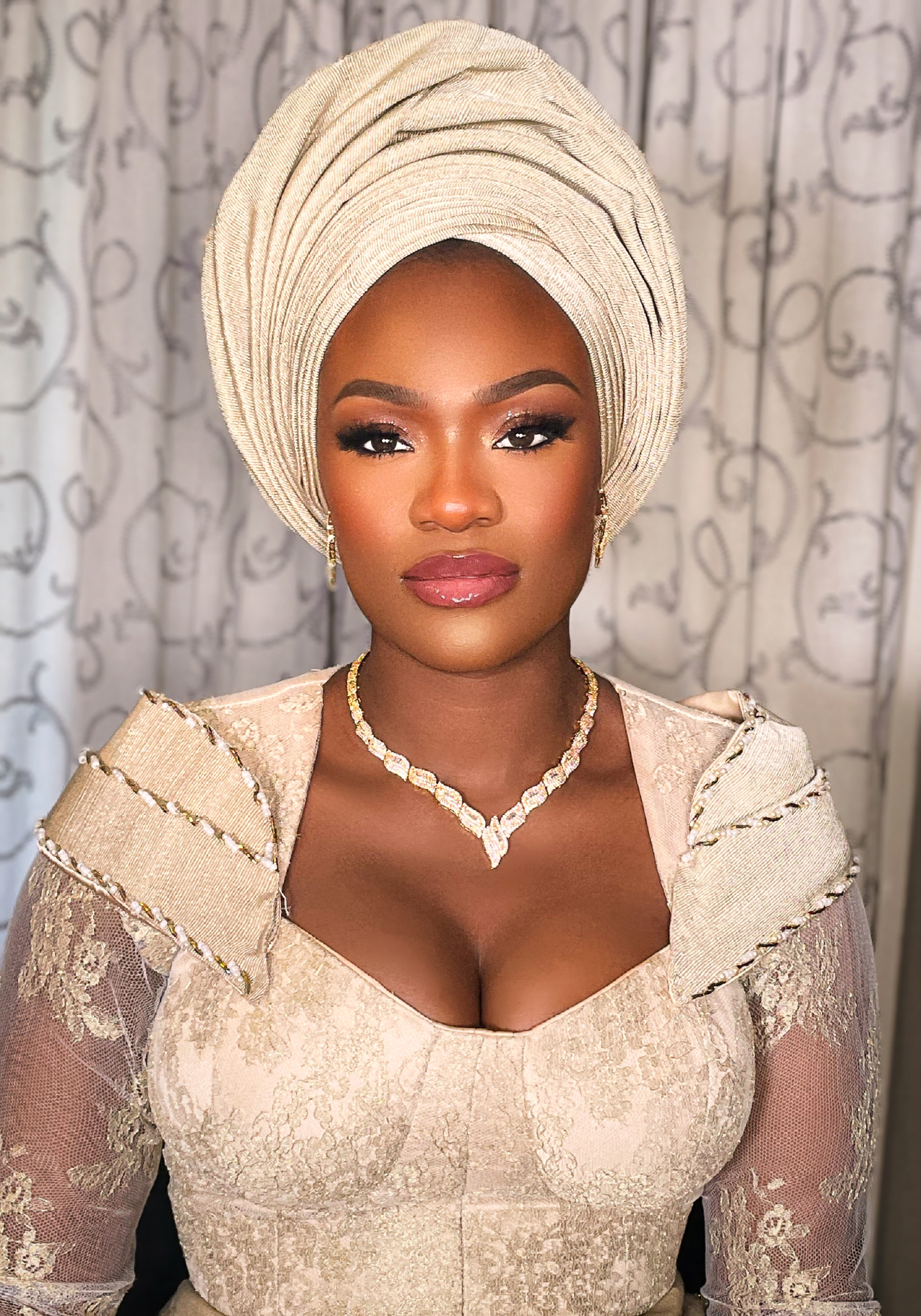 Bridal gele with soft glam
